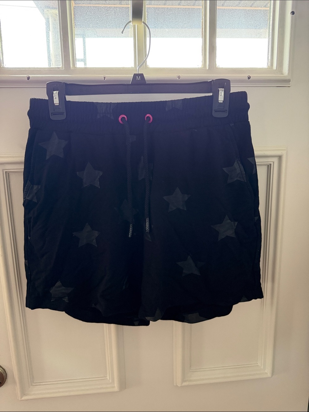 Terez Black Star-Print Athletic Shorts with Pink Eyelets